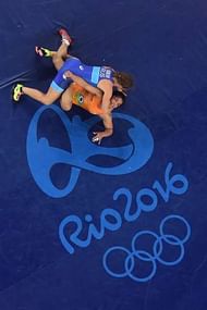 RIO DE JANEIRO, BRAZIL - AUGUST 17: Sakshi Malik (bottom) of India competes against Valeriia Koblova Zholobova of Russia during a Women's Freestyle 58kg Quarterfinal bout on Day 12 of the Rio 2016 Olympic Games at Caioca Arena 2 on August 17, 2016 in Rio de Janeiro, Brazil. (Photo by Lars Baron/Getty Images)